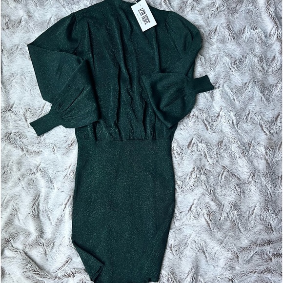 Sanibel Emerald Shimmer Mini Dress
by 12th Tribe - Picture 5 of 6